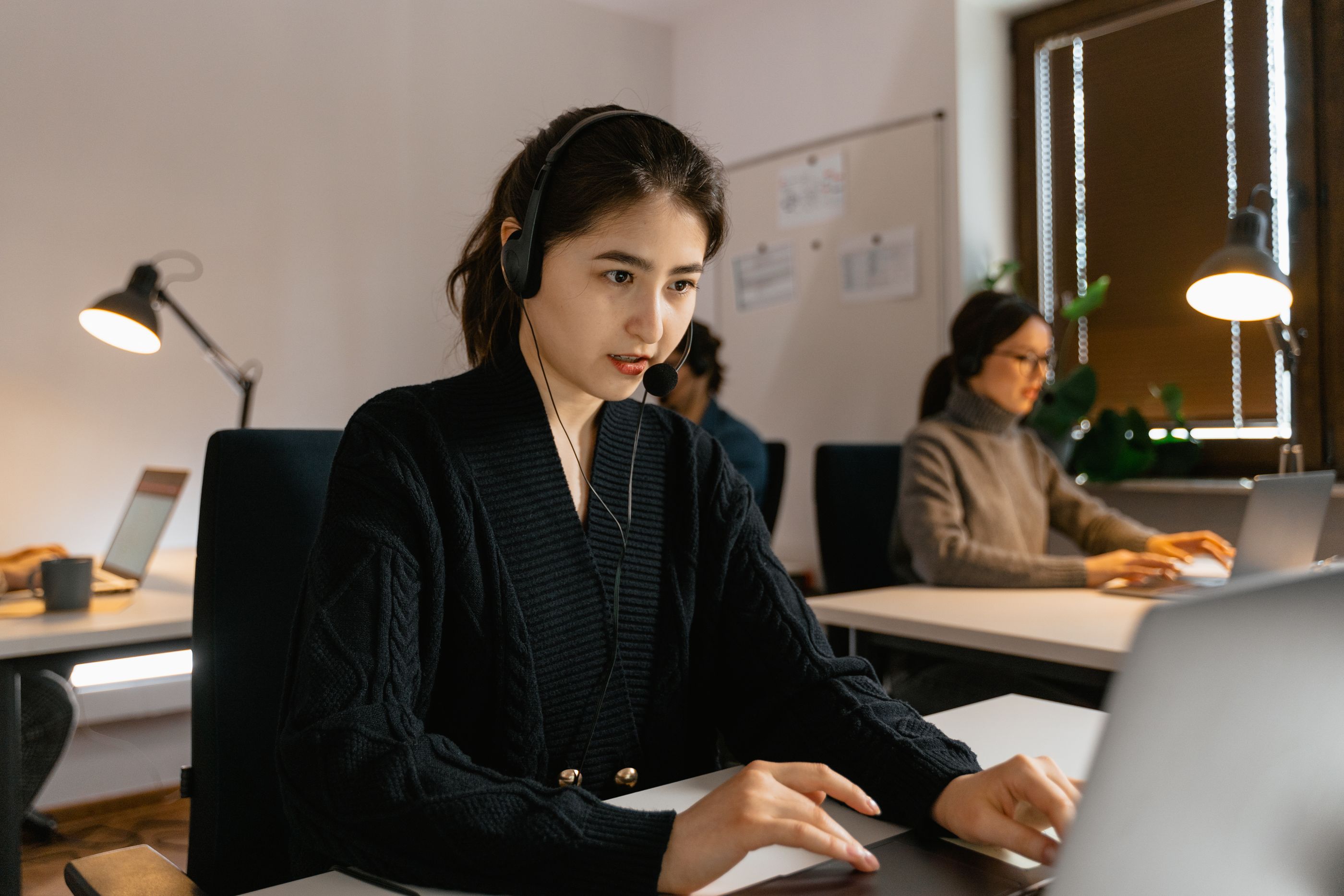A support team member wearing a headset