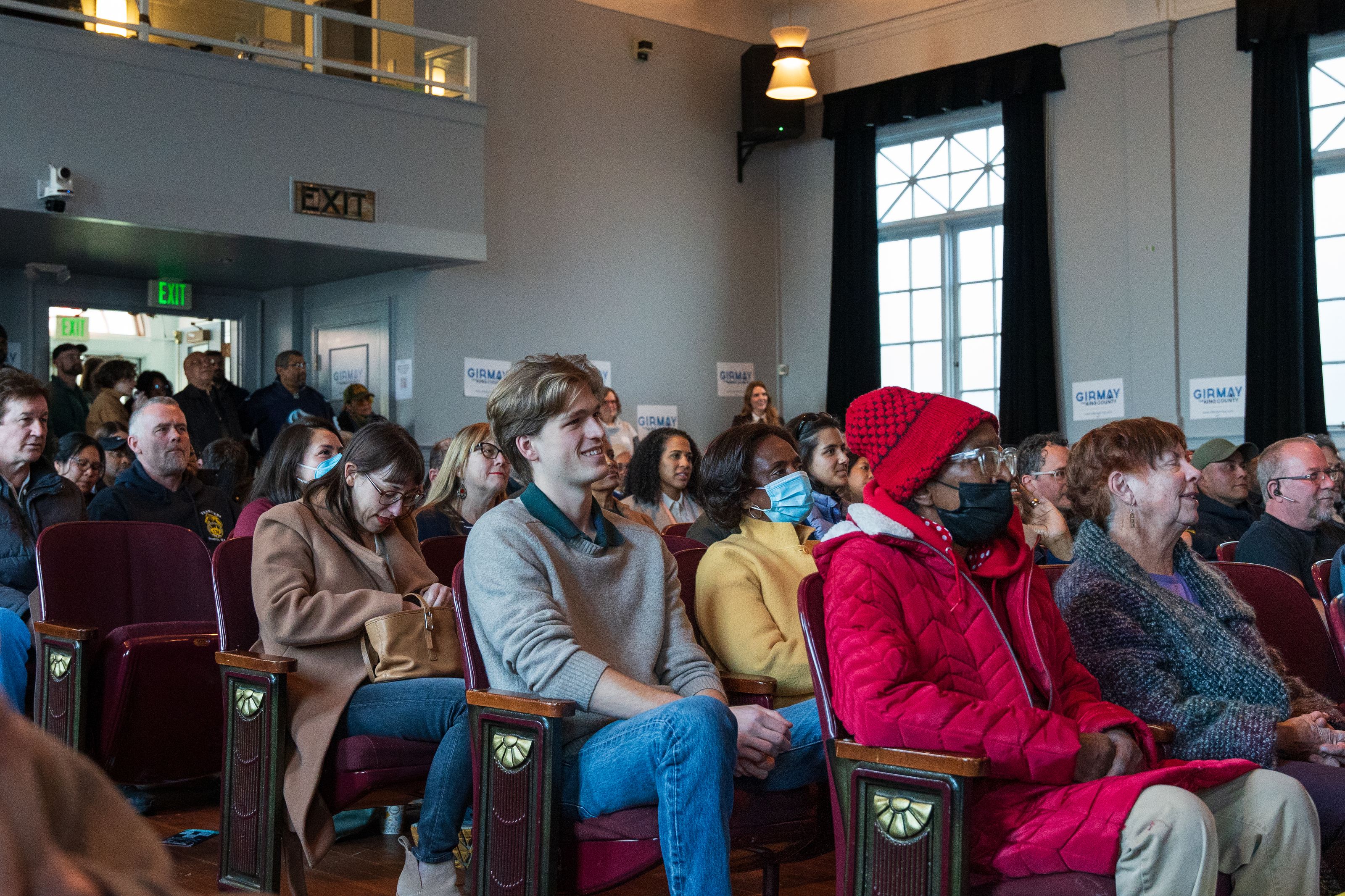 A diverse audience at a county community meeting